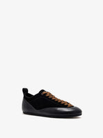Proenza Schouler front 3/4 image of Arcadia Sneakers in black with tan laces