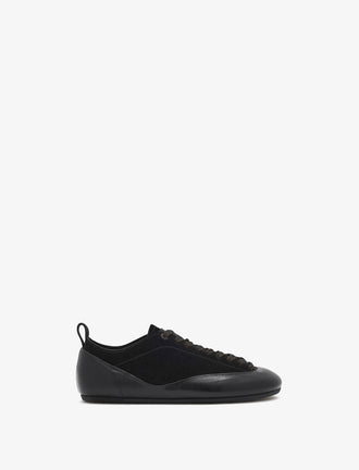 Proenza Schouler side image of Arcadia Sneakers in black with black laces