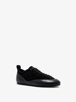 Proenza Schouler front 3/4 image of Arcadia Sneakers in black with black laces