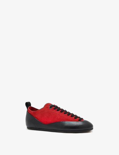 Proenza Schouler front 3/4 image of Arcadia Sneakers in red with black laces