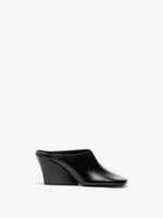 Proenza Schouler Front image of Slant Mules in Slick Calf in Black