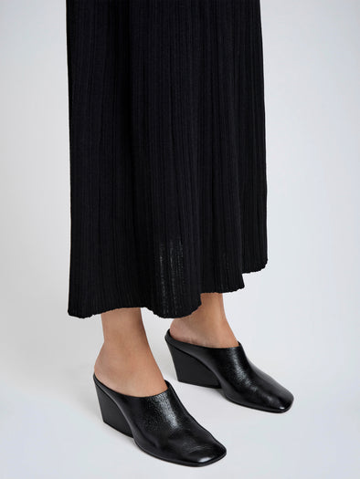 Proenza Schouler Image of model wearing Slant Mules in Slick Calf in Black