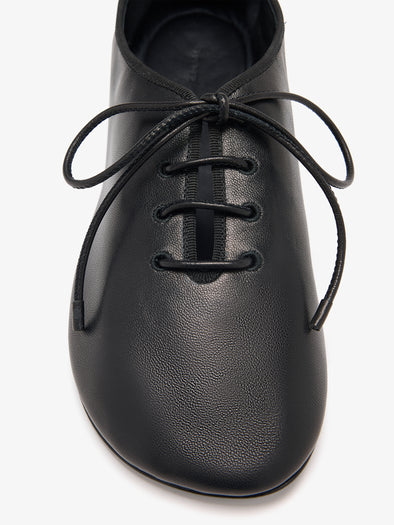 Detail image of Glove Lace Up Flats in Black