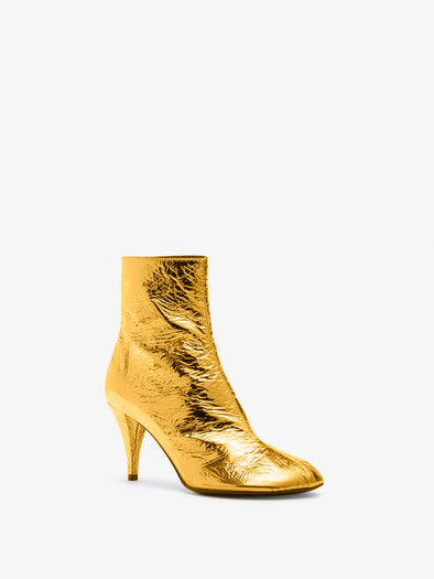 Proenza Schouler 3/4 Front image of Glove Ankle Boots in Crinkle Gold in Gold