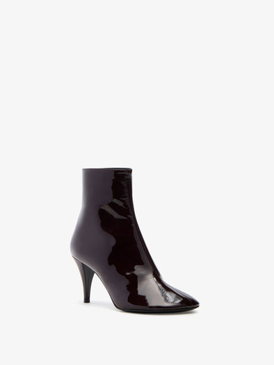 Proenza Schouler 3/4 Front image of Glove Ankle Boots in Soft Patent in Currant