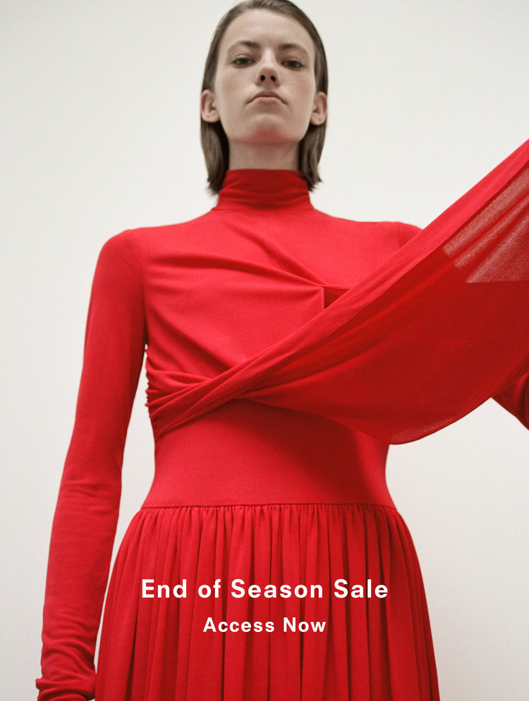 Cropped image of model wearing Meret Dress in Crepe Jersey in red, 'End of Season Sale, Access Now'