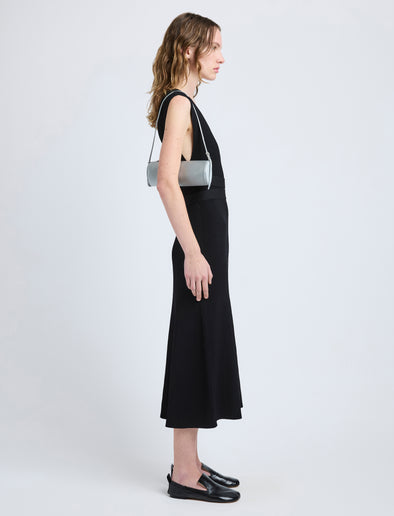 Proenza Schouler image of model carrying Silo Bag in Satin in smoke