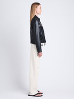 Side full length image of model wearing Annabel Jacket In Lightweight Leather in BLACK