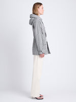 Side full length image of model wearing Nina Coat In Grid Cotton Crinkle in BLACK/IVORY