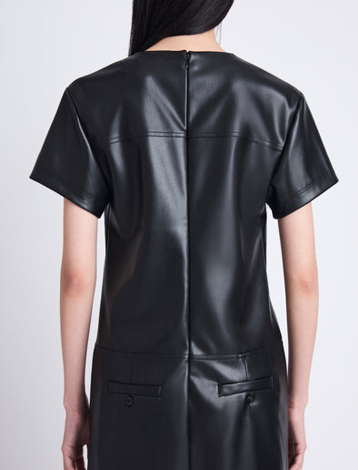 Detail image of model wearing Sonny Dress In Faux Leather in BLACK