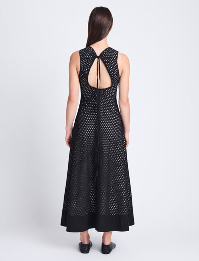 Back full length image of model wearing Juno Dress In Broderie Anglaise in BLACK/OFF WHITE