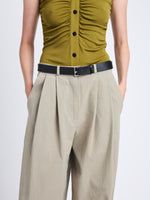 Detail image of model wearing Amber Pant In Solid Cotton Crinkle in BAYLEAF