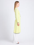 Side full length image of model wearing Cameron Dress In Boucle Viscose in CITRINE