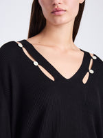 Detail image of model wearing Elsie Top In Midweight Button Details Knits in BLACK