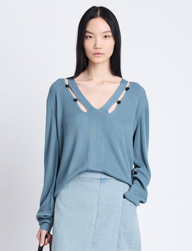 Front cropped image of model wearing Elsie Top In Midweight Button Details Knits in JUNIPER