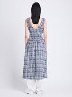 Back full length image of model wearing Penny Dress in Grid Poplin in NAVY/OFF WHITE