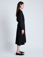 Side image of model wearing Nelson Dress in Crinkled Flou in BLACK