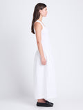 Side full length image of model wearing Malia Dress in Peached Poplin in WHITE