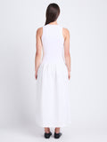 Back full length image of model wearing Malia Dress in Peached Poplin in WHITE