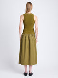 Back full length image of model wearing Malia Dress in Peached Poplin in OLIVE