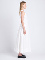 Side full length image of model wearing Libby Dress In Poplin in OFF WHITE