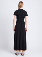 Back full length image of model wearing Noelle Dress in Jersey in BLACK