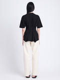 Back full length image of model wearing Mira T-Shirt in Jersey in BLACK