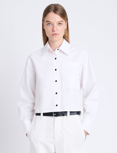 Front cropped image of model wearing Alma Shirt in Peached Poplin in WHITE