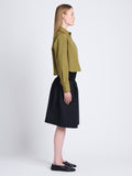 Side full length image of model wearing Olive Skirt in Peached Poplin in BLACK