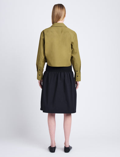 Back full length image of model wearing Olive Skirt in Peached Poplin in BLACK