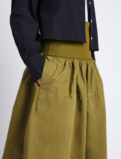 Detail image of model wearing Olive Skirt in Peached Poplin in OLIVE