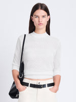 Cropped front image of model wearing Nicola Sweater in Zig Zag Pointelle in OFF WHITE