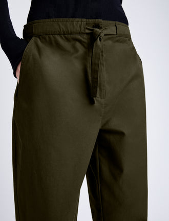 Proenza Schouler Detail image of model wearing Preston Drawstring Pant in Tech Cotton in DARK FERN