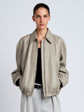 Proenza Schouler Front cropped image of model wearing Beck Bomber in Lightweight Nappa in Granite