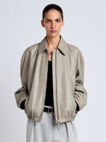 Proenza Schouler Front cropped image of model wearing Beck Bomber in Lightweight Nappa in Granite