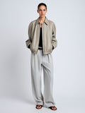 Proenza Schouler Front full length image of model wearing Beck Bomber in Lightweight Nappa in Granite