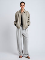 Proenza Schouler Front full length image of model wearing Beck Bomber in Lightweight Nappa in Granite