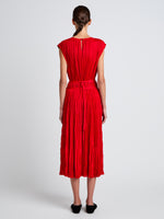 Proenza Schouler Back full length image of model wearing Rosalyn Skirt in Pleated Jersey in Dark Poppy