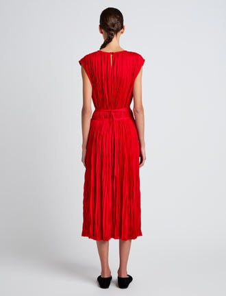 Proenza Schouler Back full length image of model wearing Rosalyn Skirt in Pleated Jersey in Dark Poppy