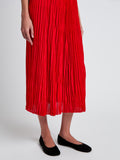 Proenza Schouler Detail image of model wearing Rosalyn Skirt in Pleated Jersey in Dark Poppy