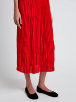 Proenza Schouler Detail image of model wearing Rosalyn Skirt in Pleated Jersey in Dark Poppy