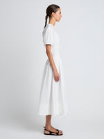 Proenza Schouler Side full length image of model wearing Austin Skirt In Cotton Sateen in White