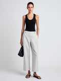 Proenza Schouler Front full length image of model wearing Cali Pant in Stretch Cotton Suiting in Pale Grey