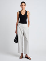 Proenza Schouler Front full length image of model wearing Cali Pant in Stretch Cotton Suiting in Pale Grey