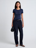 Proenza Schouler Front full length image of model wearing Aston Pant in Tech Cotton in Navy