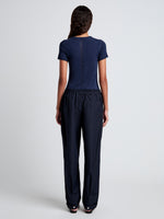 Proenza Schouler back full length image of model wearing Aston Pant in Tech Cotton in Navy
