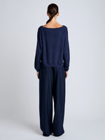 Proenza Schouler Back full length image of model wearing Conley Knit Sweater in Lightweight Merino in Navy Melange
