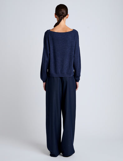 Proenza Schouler Back full length image of model wearing Conley Knit Sweater in Lightweight Merino in Navy Melange
