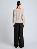 Proenza Schouler Back full length image of model wearing Conley Knit Sweater in Lightweight Merino in Light Rose Melange