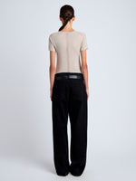 Proenza Schouler Back full length image of model wearing Blaine Knit Shirt in Lightweight Merino in Light Rose Melange